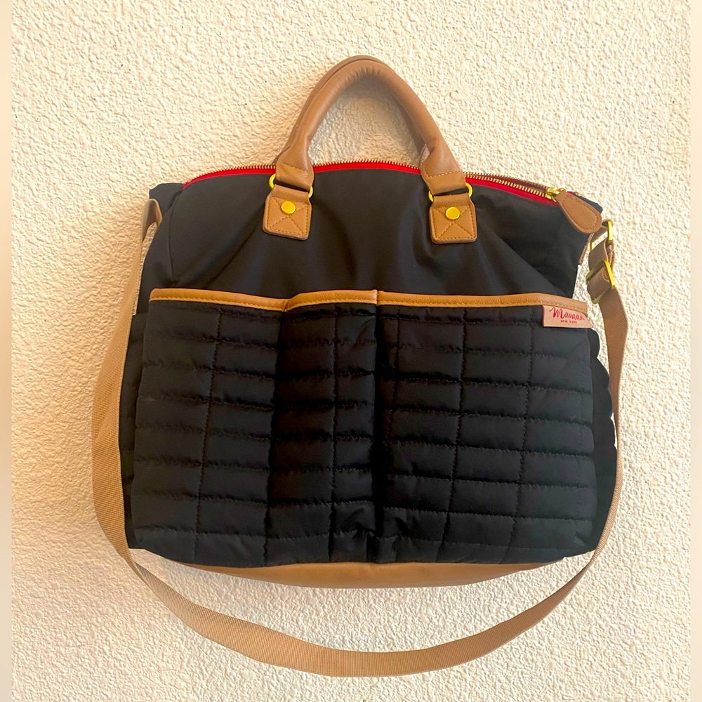 Barely used perfect condition designer diaper bag. Black & tan. Maman New York.